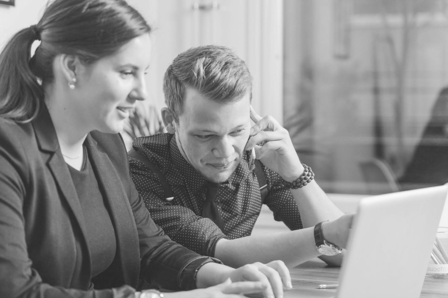 Financial professionals collaborating on analytical projects and business strategy