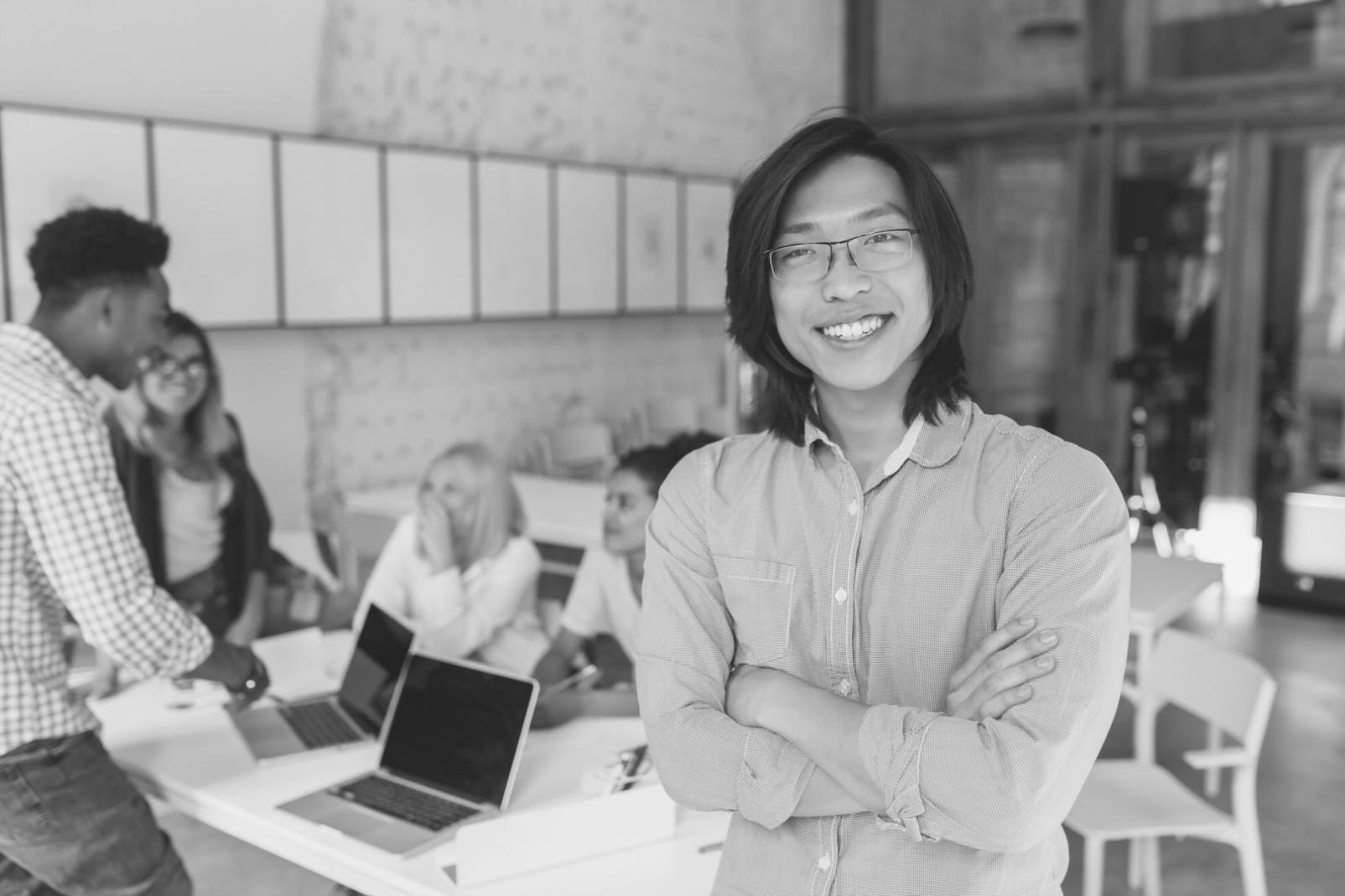 Financial analyst reviewing complex valuation model on multiple monitors